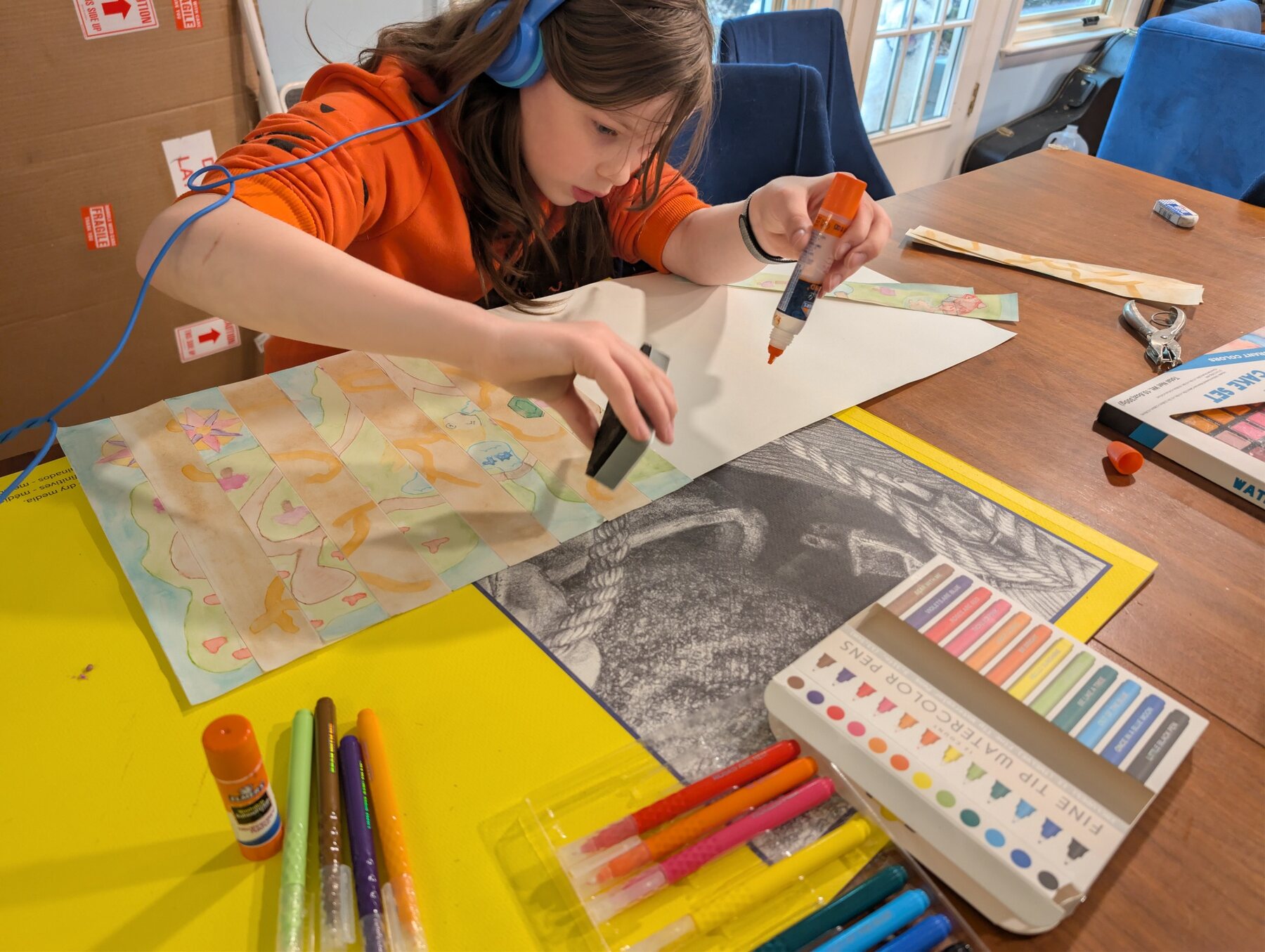 A student creating original artwork for an Odyssey of the Mind solution